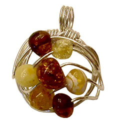 Very original contemporary design wire-woven multi-color amber pendant, in a semi-circle shape.  Amber beads are honey, citrine, cream-colored and cognac.  Matching earrings - see item 9814030.