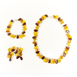 Matching set earrings, bracelet and necklace. Outstanding value! Archaeological evidence of Baltic amber’s use as a trade commodity dates back to 8000 B.C., and it is recorded that Phoenician sea-traders carried amber throughout the known world four thous