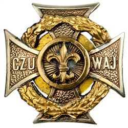 Hand made in Warsaw by our master engraver this beautiful two tone metal badge is the emblem of the Polish Scouts with their motto, "Czuwaj" in Polish meaning "Watch!" or "Be Prepared"