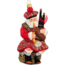 This Scottish Santa wishes you and yours a very Nollaig Chridheil! Artfully crafted of glass from Poland and painted plaid with glittering accents, this 5ï¿½" tall ornament will add a touch of Scotland's enchanting charm t