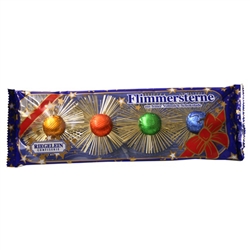 Made In Germany these round tinsel stars are made to hang on the Christmas tree.   Each center is made up of two round milk chocolate tabs covered in colorful foil.  Careful not to hang them close to lights as they will melt.  Approximately 3" (7cm) in di