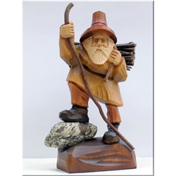 Polish gnomes ,"Krasnoludki", have been popularized in Polish children's fairytales for many years. Authors Jan Brzecha and Maria Konopnicka immediately come to mind.  This beautiful hand carved Grandfather Krasnal is on his way back home.