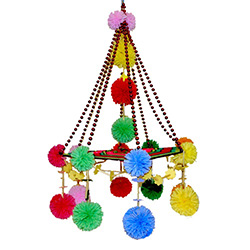 This pajak comes from the town of Nieborow, not far from Lowicz.  It is made with tissue paper, straw and feature a center of colorful yarns.   Some have strings of beads and no two are ever alike.  Completely made by hand by our local artist, each takes