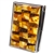 Unique and beautifully hand-crafted amber mosaic combination business card and note pad holder with pen.  Artistic mosaic of varied colored and shaped amber pieces applied to the top of a stainless steel business card holder. Spring clip to hold down busi