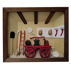 Poland has a long history of craftsmen working with wood in southern Poland. Their workshops produce beautiful hand made boxes, plates and carvings.  This shadow box is a look inside a an old fashioned Polish firehouse.
Entirely made by hand so no two ar