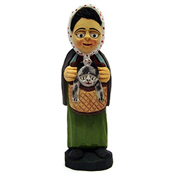 Delightful hand-carved figurine of a Polish woman holding her pet kitty-cat in a basket.  Something for that cat lover in the family, or just makes a wonderful display in the curio cabinet.