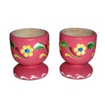 Hand painted wooden egg holders from Poland with beautiful floral patterns.  Sold in pairs only.   9 colors available but we do not have all colors in stock at all times.