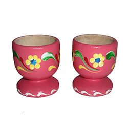 Hand painted wooden egg holders from Poland with beautiful floral patterns.  Sold in pairs only.   9 colors available but we do not have all colors in stock at all times.