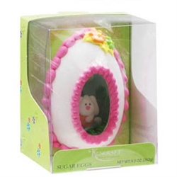 Large sugar panoramic Easter Egg with a miniature sugar Easter chick or bunny sitting on green "sugar grass" inside.   Floral design on the outside, surrounded by a decorative band of icing.  Packaged in a very nice display box.