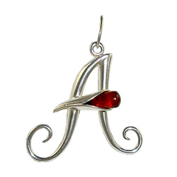 Approximately 1" tall - (2.5cm) size sterling silver and amber pendant.  Classic Calla Lily shape.