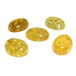 Approx .5" x 62" x .25" thick - 11mm x 15mm x 6mm thick.  These oval domed amber cabochons are quite sparkly.  Price is per piece.