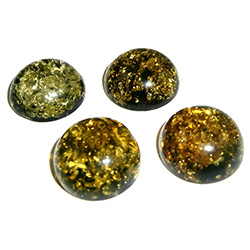 Approx .5" x .25: thick - 15mm x 6mm thick.  These round domed amber cabachons have backs painted black which produces their green color.  Price is per piece.