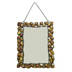 Hand made metal frame decorated with genuine natural amber stones.  There are three minor flaws in the mirror's edge so we are discounting.