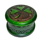 Beautiful Polish craftsmanship with an Irish theme.  Round box with shamrock design, metal inlay accents and vibrant green finish.