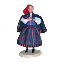 This colorful costume is from the region around the city of Kielce in southeastern part of Poland which was part of the greater Malopolska (Little Poland) region.  These dolls are  clothed in authentic regional folk costumes, as certified by the Polish Mi