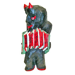 Devils in Polish folklore are a common theme and often with comic elements.  This Polish "diabel" has a nice accordion in his favorite colors.