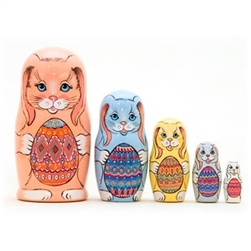 These bunnies would love to hop into your child's Easter basket! The 5 rabbits in this set nest together. Each is brightly colored and holding a traditional Ukrainian Pisanke Easter egg. A great gift for Easter or your favorite rabbit lover! A great matry