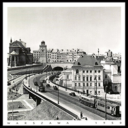 This photograph is of the bridge traffic from Praga to Warsaw over the Vistula approaching the tunnel under Old Town.  Not much traffic at all in those days. Historical Black and White Photo Postcard.