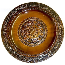 This beautiful plate is made of seasoned Linden wood, from the Tatra Mountain region of Poland. 
The skilled artisans of this region employ centuries old traditions and meticulous craftsmanship to create a finished product of uncompromising quality. This