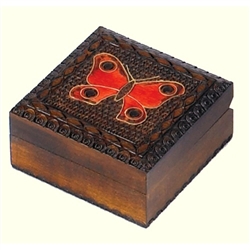 This square box features a colorful carved butterfly against a carved texture background and accented with metal inlay.