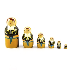 These nesting dolls come in a set of 6 ranging from 15 to 85 millimetres in size.  Made primarily from silver birch which is seasoned for a number of years before being cut and painted.