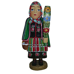 Our Pani from Lowicz is in full costume and carrying a Polish Easter palm.  In Poland Easter palms are made from dried woven flowers and are very colorful.  Carved and painted by Z. Suchinski.