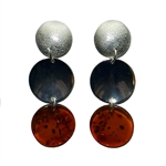 An artistic setting of amber and silver discs.  Silver posts