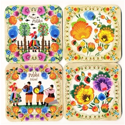This handsome set of 4 different colorful cork coasters features reproductions of Polish paper cuts both floral and folk.  Please note that there are over 40 different patterns and we cannot guarantee any specific patterns.   Coated with plastic for long