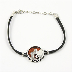 Sterling Silver and Baltic amber Aquarius zodiac sign charm on a durable cord made of black rubber.