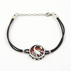 Sterling Silver and Baltic amber Scorpio zodiac sign charm on a durable cord made of black rubber.