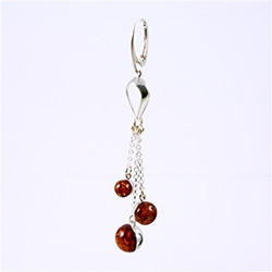 Precious-looking set of dangle earrings, consisting of a three cascading cognac spheres dangling on silver chains.