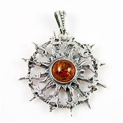 12 signs of the zodiac in sterling silver with Baltic amber stone in center.