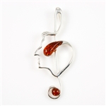 Hand made with Sterling Silver detail Amber. Use as a pendant or as a pin.