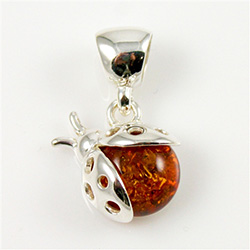 Hand made Cognac Amber Ladybug Pendant with Sterling Silver detail.