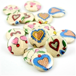 These small pinback buttons are bright and colorful, featuring traditional Polish Kashubian printed embroidery heart designs. We make these buttons in house, a Polish Art Center exclusive!