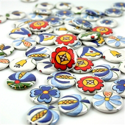 These small pin back buttons are bright and colorful, featuring traditional Polish Kashubian printed embroidery designs. We make these buttons in house, a Polish Art Center exclusive!