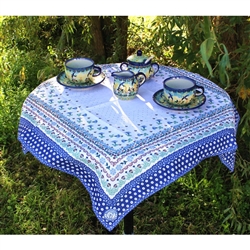 Beautiful floral pattern tablecloth produced by "Manufaktura" , a stoneware company in Boleslawiec, Poland.  Company symbol (also found on all their stoneware) is printed in one corner.