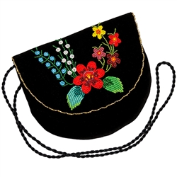 Hand beaded purse made from velvet. Fully lined. Extra long strap. Snap closure. Made in Lowicz, Poland.
Design is fixed but variations in color and shading vary from purse to purse.