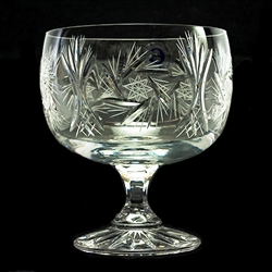 The picture shows 3 different sizes of glasses. The white wine goblet is the crystal glass on the right. This is genuine Polish lead crystal hand cut with a starburst design.