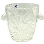 Lovely crystal ice bucket.  This is genuine Polish lead crystal hand cut with a star burst design.