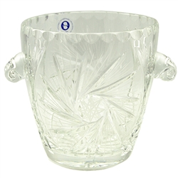 Lovely crystal ice bucket.  This is genuine Polish lead crystal hand cut with a star burst design.