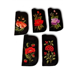 Soft black felt sewn case with hand Lowicz style embroidered flowers on one side. Beautiful and functional. Size - 6.75" x 3" - 17cm x 7.5cm. Designed to fit standard size glasses. Check yours first. Floral designs vary. No two are exactly alike.