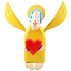 Hand carved painted folk angel by carver Maciej Manowiecki.  The artist is known for his unique, whimsical style.  His work can be characterized by the use of unconfined form, vibrant color, and lightness of style which brings each piece to life.