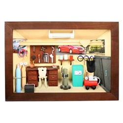 Poland has a long history of craftsmen working with wood in southern Poland. Their workshops produce beautiful hand made boxes, plates and carvings.  This shadow box is a look inside a traditional Polish vehicle repair shop.  Note the nice attention to de
