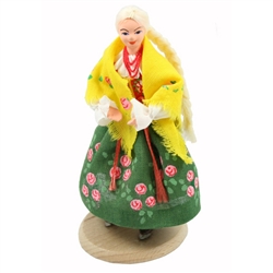 This traditional Polish doll is completely hand made the old fashioned way with papier mache, dress materials and paints.  The doll is clothed in authentic regional folk costume.