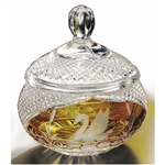 Amber colored cased crystal is a Polish specialty.  Hand blown, cut and polished from the "Julia" factory in Poland,  this beautiful covered candy dish features a swan on two sides. Beautiful etching.