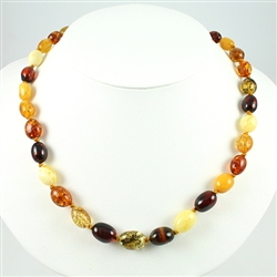 Natural Baltic Amber Cherry, Custard, Light and Dark Honey Amber Oval Amber Bead size  1/2" long by 3/8" wide bronze colored cord w/ knot between each bead. SIlver claw clasp closure.