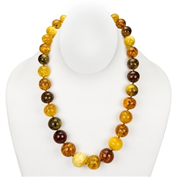 This timeless Amber necklace showcases a unique variety of Amber shades from milky white to cognac. The beauty of this necklace will last a lifetime.