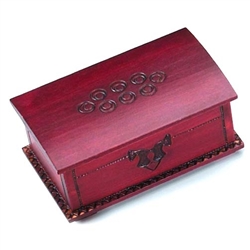 This trick box has an intricately carved Celtic pattern on the lid. At first attempt this box does not seem to open, but if you know the trick...slide the front panel to the right and lift the lid!