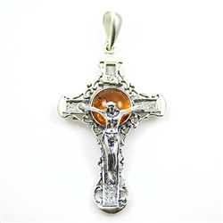 The cast antique style Sterling Silver Cross has a center of golden amber.